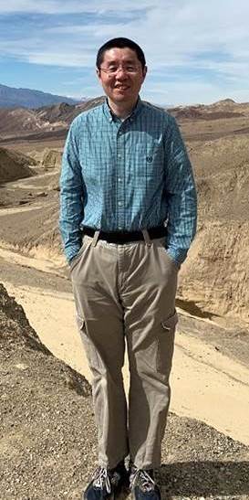 A picture containing person, clothing, ground, outdoor

Description automatically generated